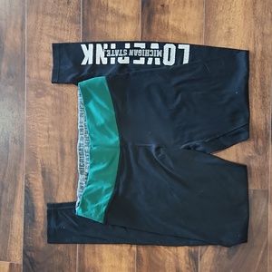 Pink Victoria's Secret reversible black leggings Size Small